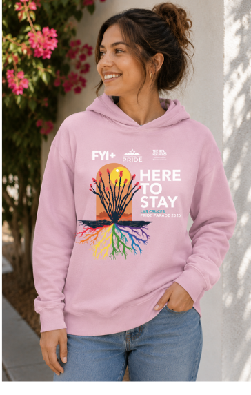 Person wearing the pink Here to Stay hoodie